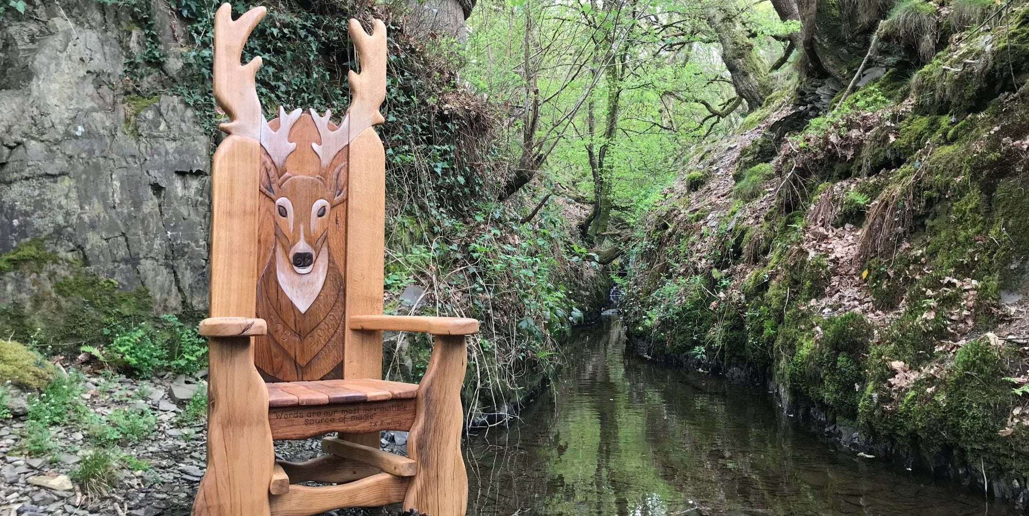 enchanted stag storytelling chair in a woodland