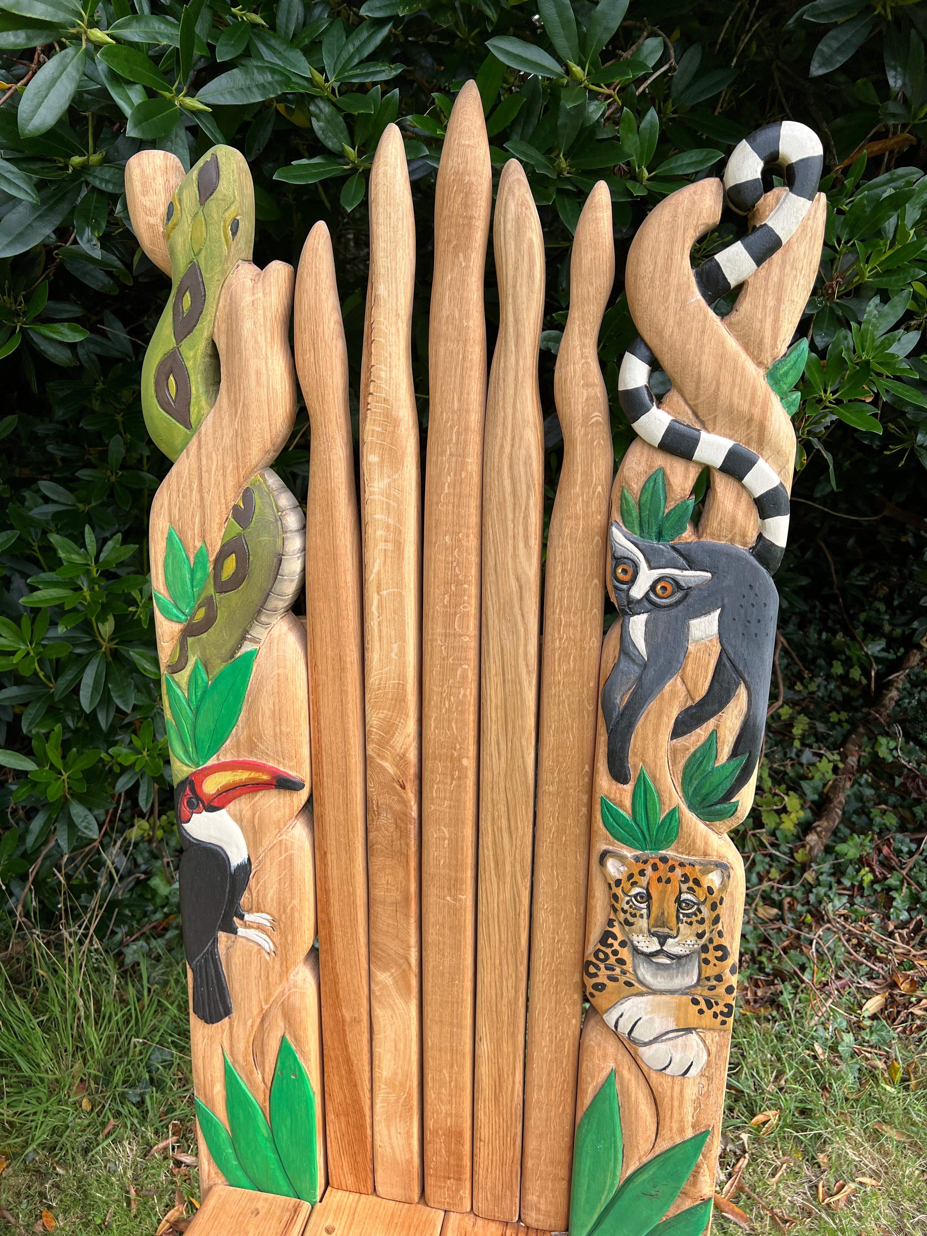 Close-up of Amazon Adventure Chair with animal carvings