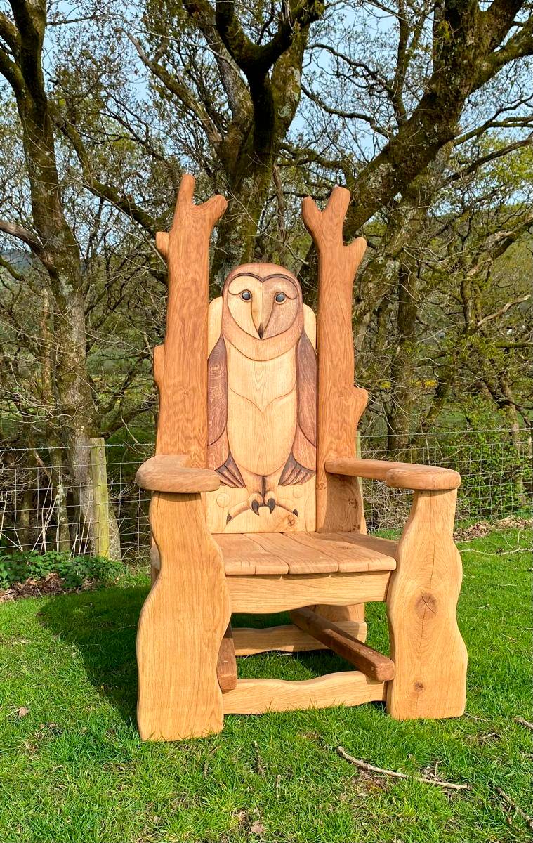 Owl storytelling chair in park setting