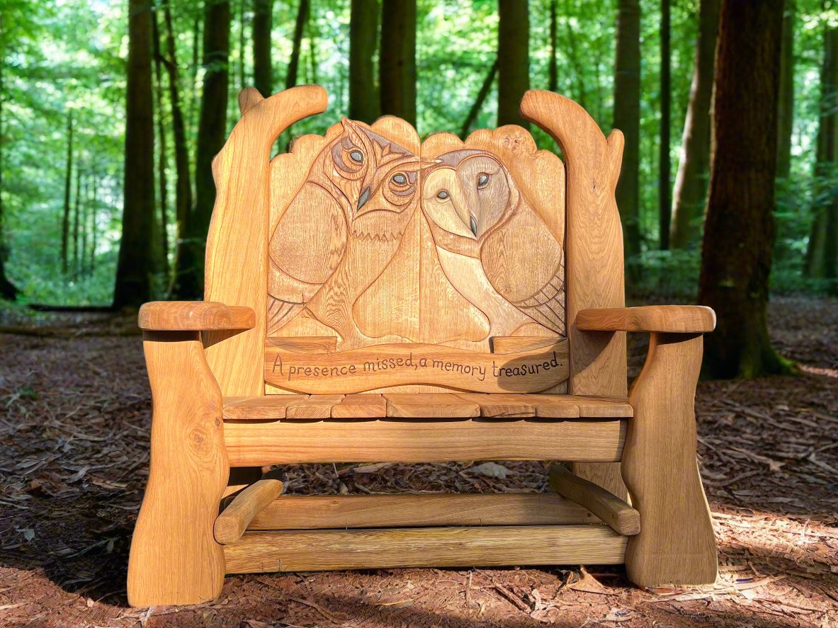 oak owl bench in woodland setting