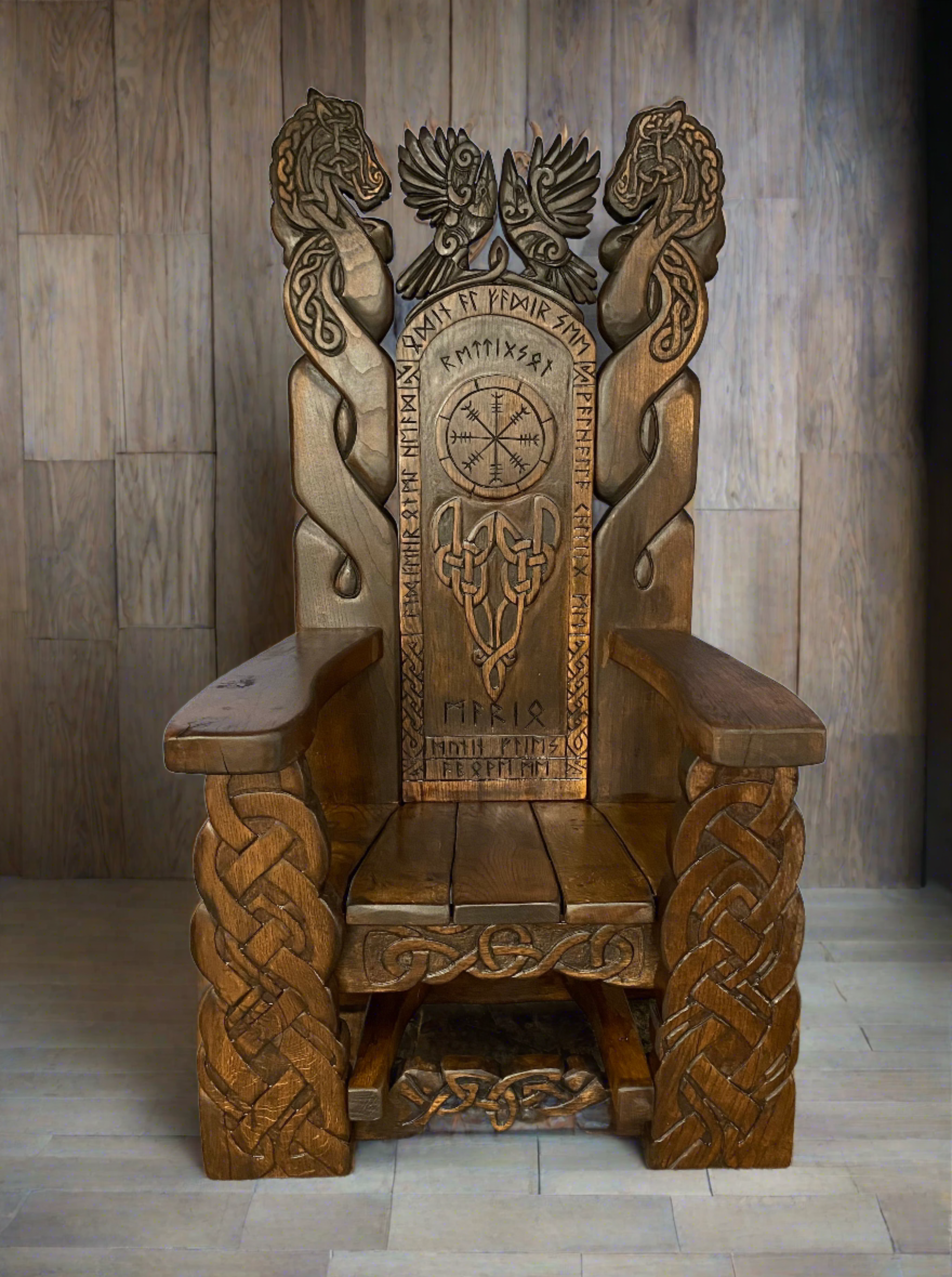 Viking Throne Chair with Celtic carvings indoors