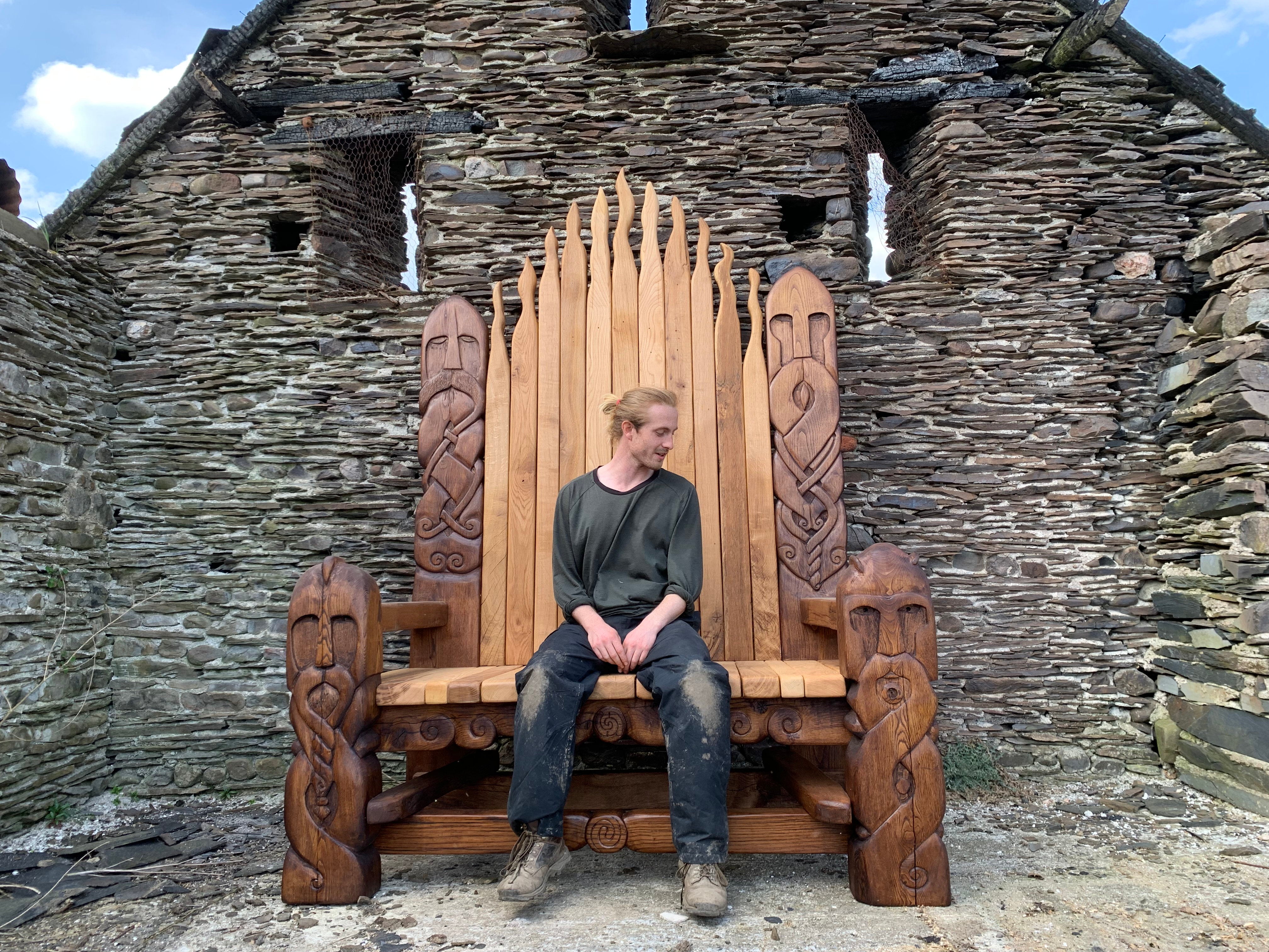 Person sitting on Viking Legend Bench Throne