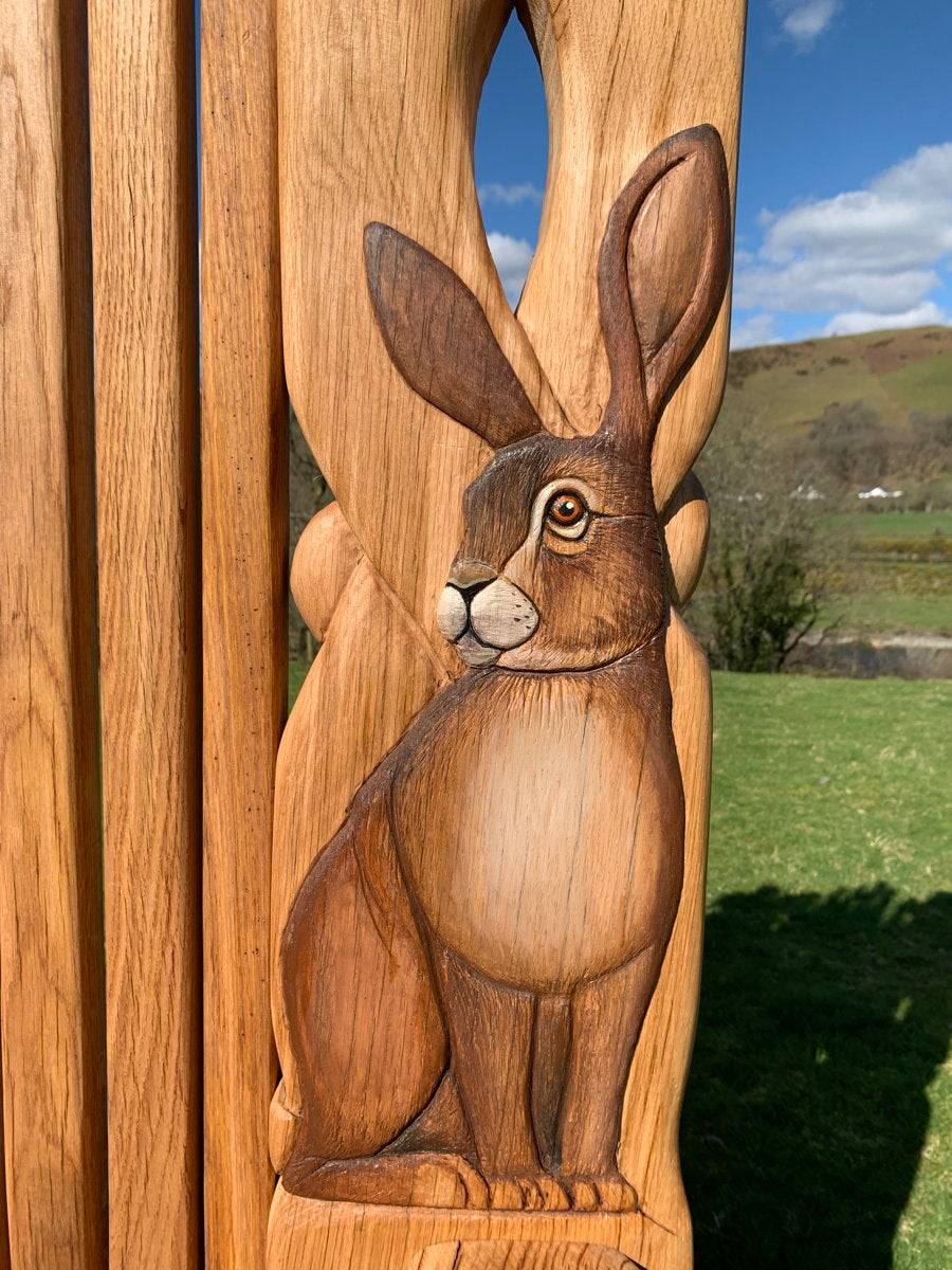 Close-up of rabbit carving on wooden throne