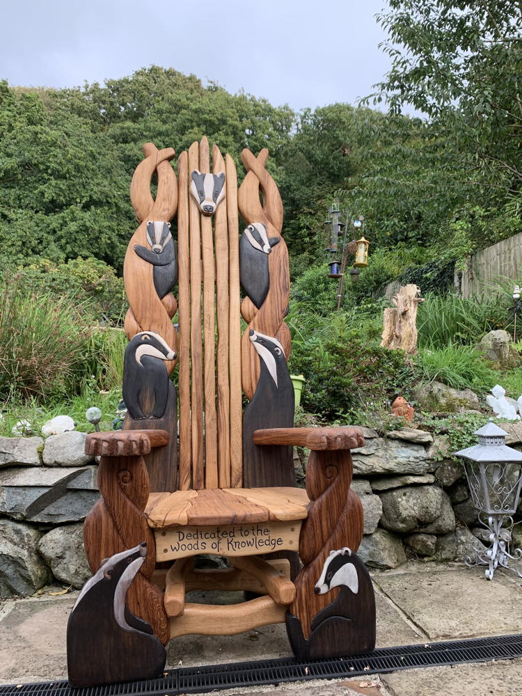 Badger Storytelling Chair in garden setting