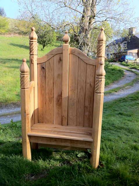 Single storytelling chair on grassy path