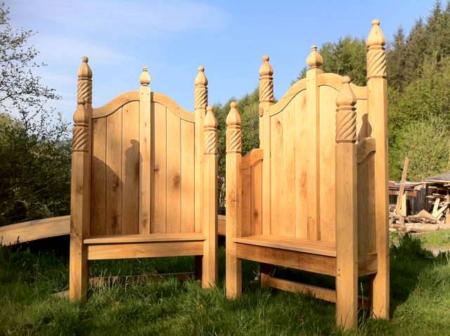 Ornate storytelling chairs in sunny garden