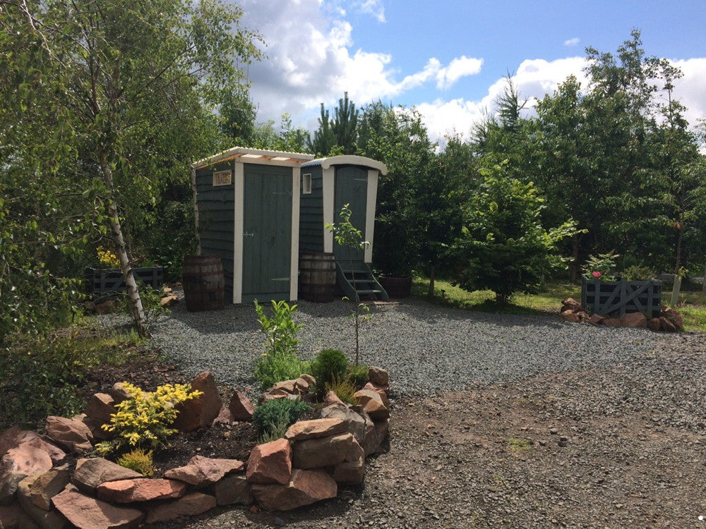 Garden area with two compost toilets