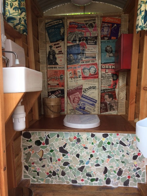 Interior of compost toilet with vintage decor