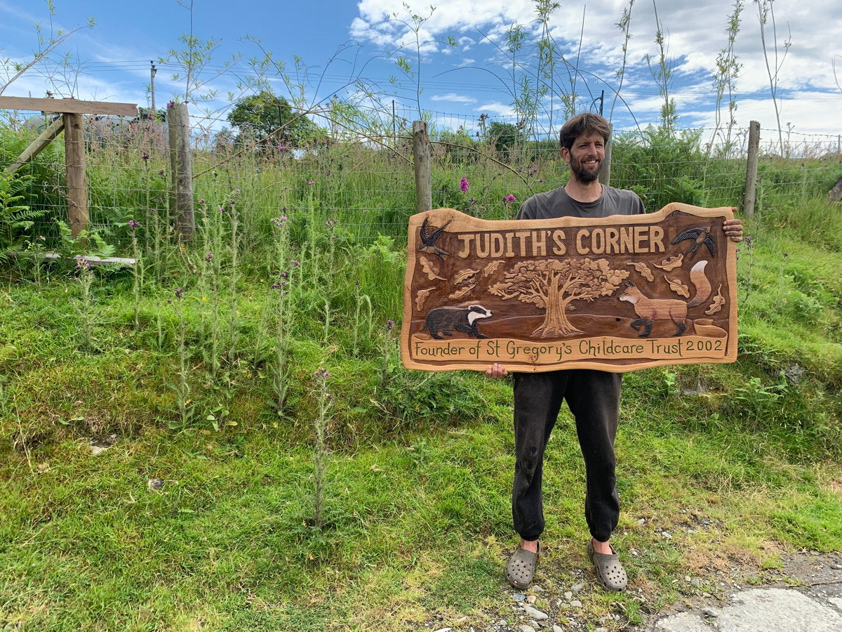 hand -carved  woodland signs