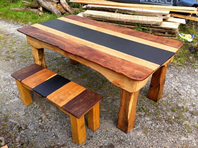 Rustic wooden table and bench set with contrasting stripes