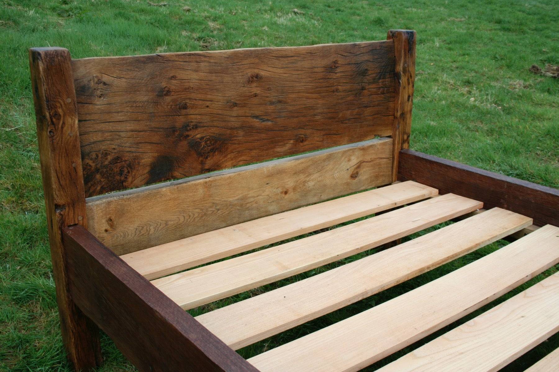 Side view of reclaimed oak bed frame