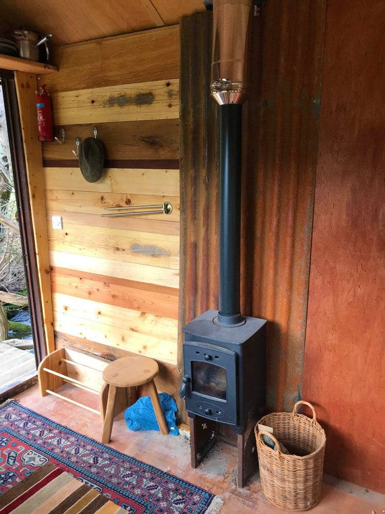 Wood-burning stove inside the Shepherd's Hut