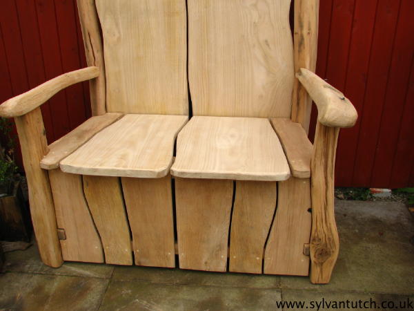 Close-up of wooden garden storage bench